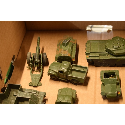 212 - A collection of Dinky toys to include military vehicles such as Centurion Tank, 7.2 Howitzer, 5.5 Me... 