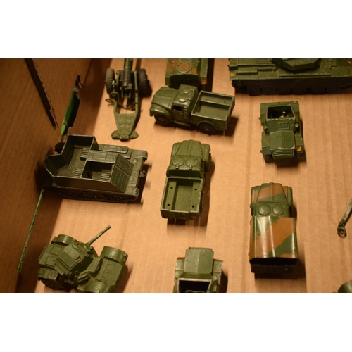 212 - A collection of Dinky toys to include military vehicles such as Centurion Tank, 7.2 Howitzer, 5.5 Me... 