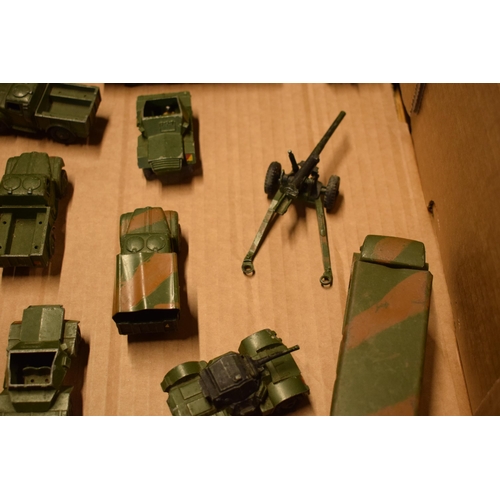 212 - A collection of Dinky toys to include military vehicles such as Centurion Tank, 7.2 Howitzer, 5.5 Me... 