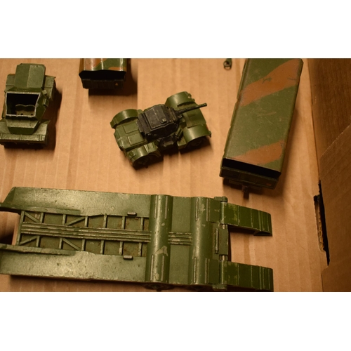 212 - A collection of Dinky toys to include military vehicles such as Centurion Tank, 7.2 Howitzer, 5.5 Me... 