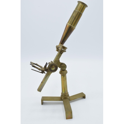 215 - An antique brass folding Bithray Royal Exchange London Cary-Gould microscope with folding tri-footed... 