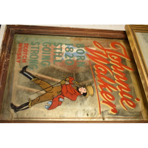 219 - A collection of framed items to include vintage Johnnie Walker Scotch Whisky pub advertising mirror,... 