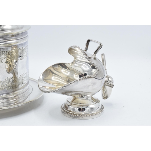 235 - A collection of silver plated items to include a biscuit jar, sugar bowl and scoop, a salt and sever... 