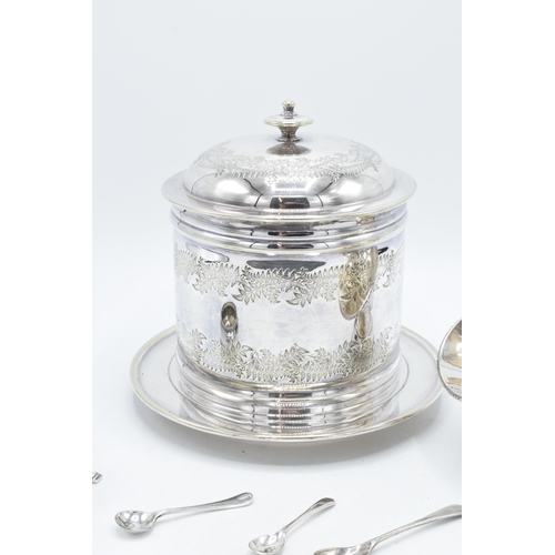 235 - A collection of silver plated items to include a biscuit jar, sugar bowl and scoop, a salt and sever... 