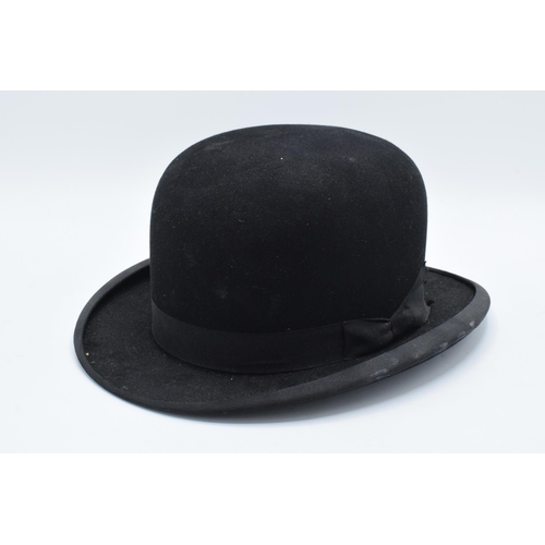 245 - A black felt bowler hat by the Atlas brand