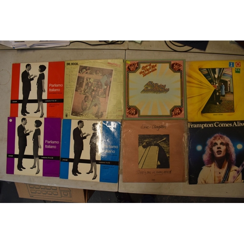 245G - A collection of vinyl records to include artists such as Eric Clapton, Yes, Wishbone Ash and other s... 