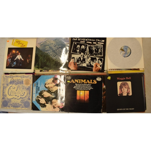 245G - A collection of vinyl records to include artists such as Eric Clapton, Yes, Wishbone Ash and other s... 