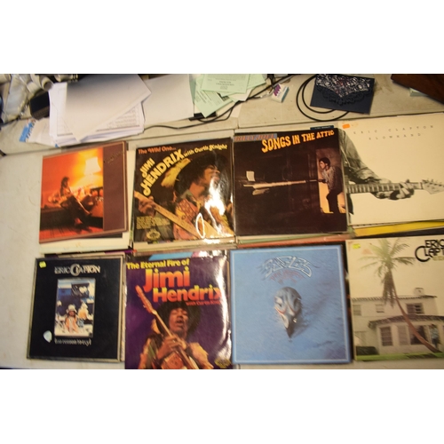 245G - A collection of vinyl records to include artists such as Eric Clapton, Yes, Wishbone Ash and other s... 