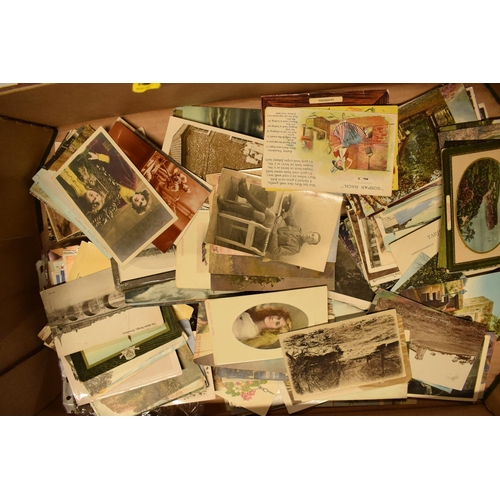 248 - A mixed collection of printed materials to include postcards of varying ages to include late 19th ce... 