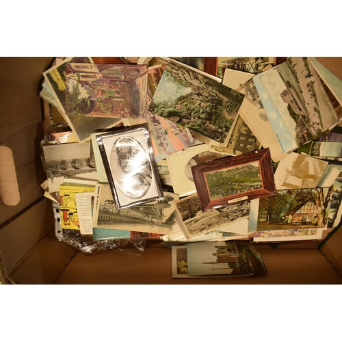 248 - A mixed collection of printed materials to include postcards of varying ages to include late 19th ce... 