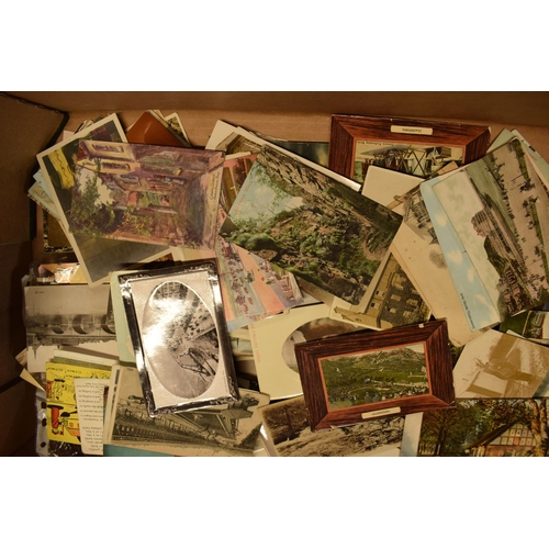 248 - A mixed collection of printed materials to include postcards of varying ages to include late 19th ce... 