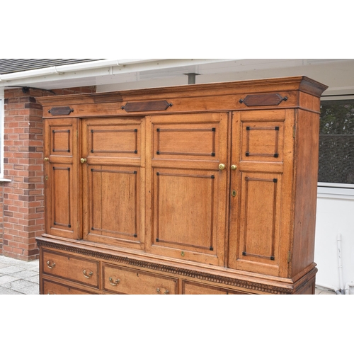 253 - George III light oak housekeepers cupboard, the upper section with 4 cupboards over 6 drawer base. 2... 