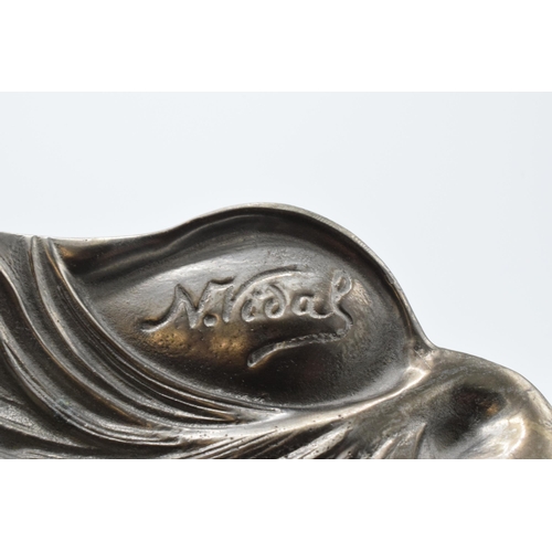 256 - An Art Nouveau style ink stand decorated with a lady amongst flowers with 'N. Vidal' signature to ri... 