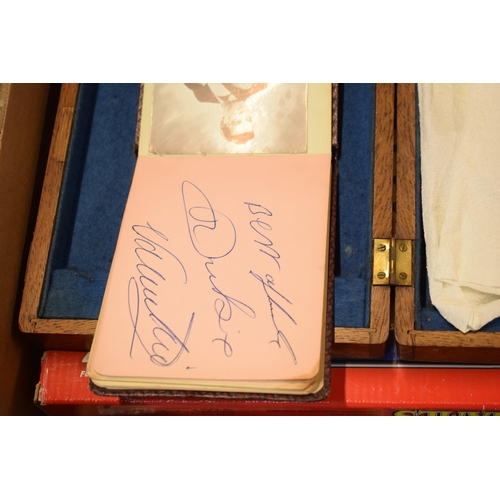 262 - A mixed collection of items to include an album featuring Dickie Valentine's autograph, brass bowls,... 