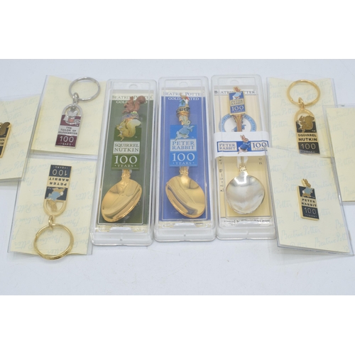 271 - A collection of Beatrix Potter related items to include gold plated and enamelled centenary tea spoo... 