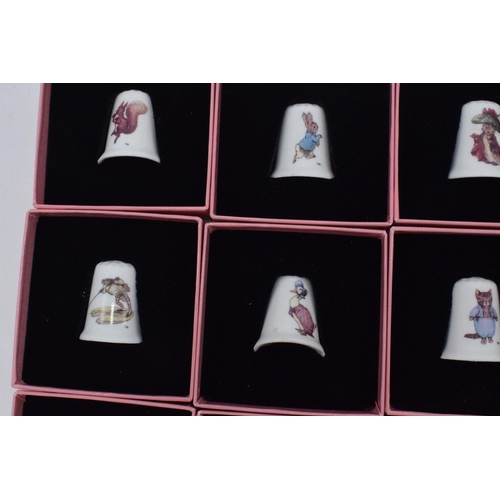 273 - The World of Beatrix Potter full set of twelve bone china thimbles with original boxes (12).