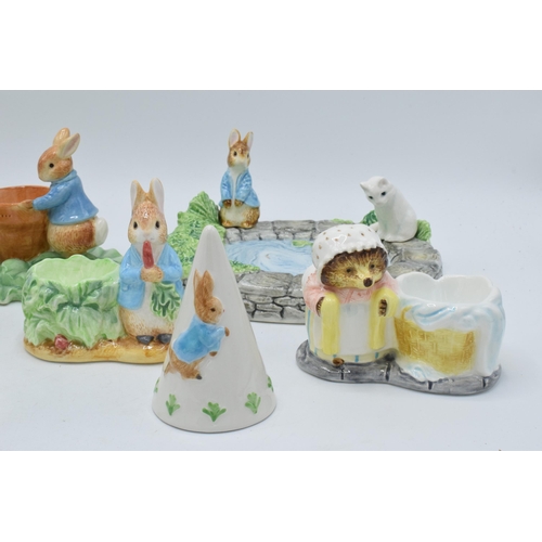 280 - A collection of Beatrix Potter ceramic items to include 5 x Enesco egg cups, an Enesco soap dish, Bo... 