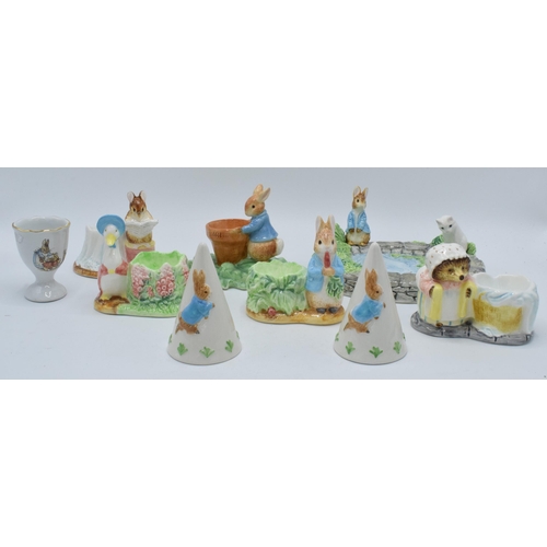 280 - A collection of Beatrix Potter ceramic items to include 5 x Enesco egg cups, an Enesco soap dish, Bo... 