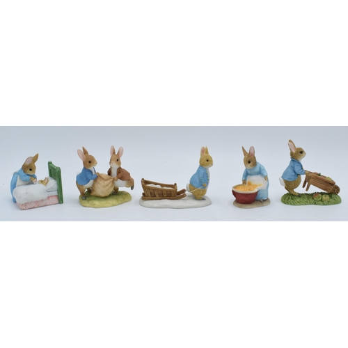 281 - A collection of Border Fine Arts Studio World of Beatrix Potter figures to include Peter Pushing Whe... 