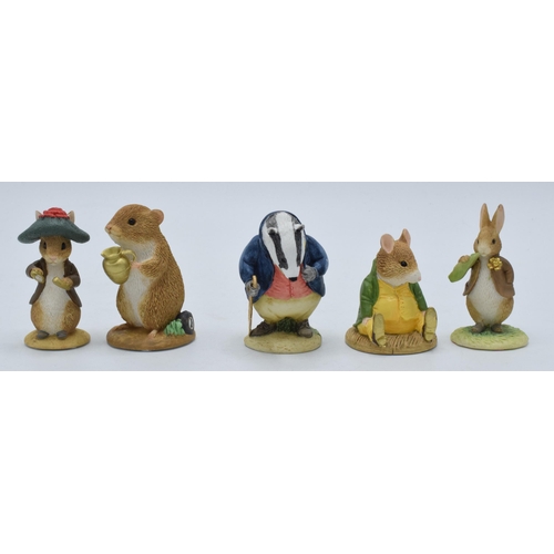 293 - A collection of Enesco Friends of Peter Rabbit Club figures to include Benjamin Bunny, Samuel Whiske... 