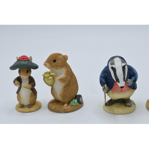 293 - A collection of Enesco Friends of Peter Rabbit Club figures to include Benjamin Bunny, Samuel Whiske... 