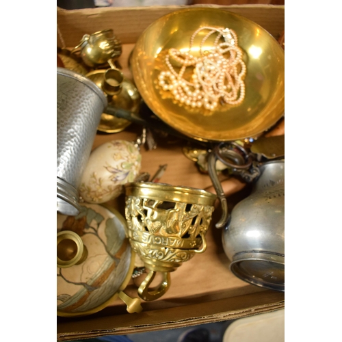 298 - A collection of metalware and similar items to include brassware, pewter tankards and brass items et... 