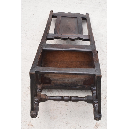 306 - An early to mid 19th century Wainscot-style oak chair with carved back panel, 108cm tall.