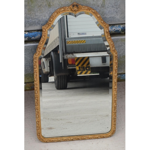 308 - A vintage mid 20th century gilt-style wall mirror, 75cm tall.