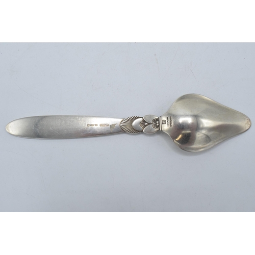 338 - Georg Jensen: Sterling silver spoon of triangular form with full hallmarks to reverse. 15cm long. 34... 