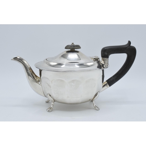 344 - A silver 3-piece tea set to include a teapot with ebonised handle, sugar bowl and milk jug (3). Gros... 