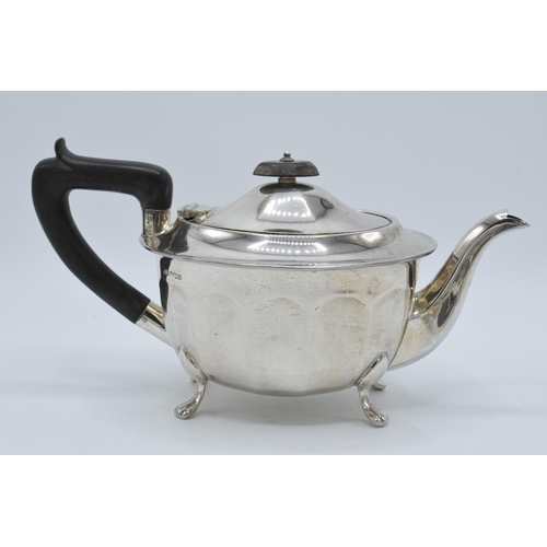 344 - A silver 3-piece tea set to include a teapot with ebonised handle, sugar bowl and milk jug (3). Gros... 