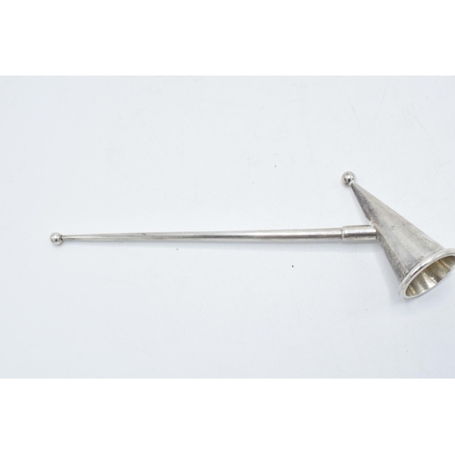 347 - A hallmarked silver candle snuffer, London 1986, D J Anderson. 14cm long.