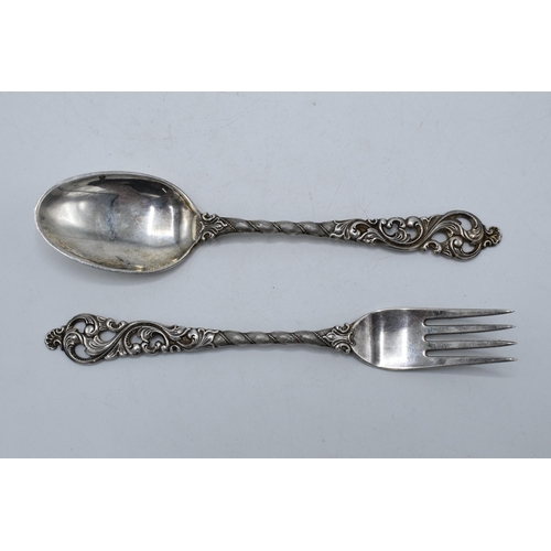 360 - Silver (.830) ornate spoon and fork (2). 63.2 grams.