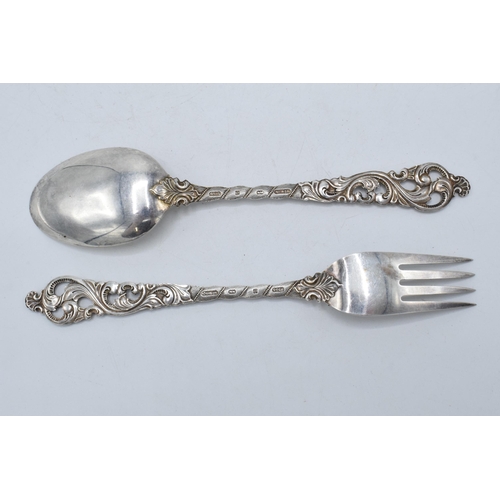 360 - Silver (.830) ornate spoon and fork (2). 63.2 grams.