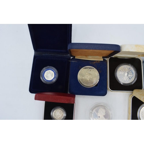 379 - Silver Coins and other coins that includes sterling silver crowns 1980 with boxes & COA x 2, Boxed &... 