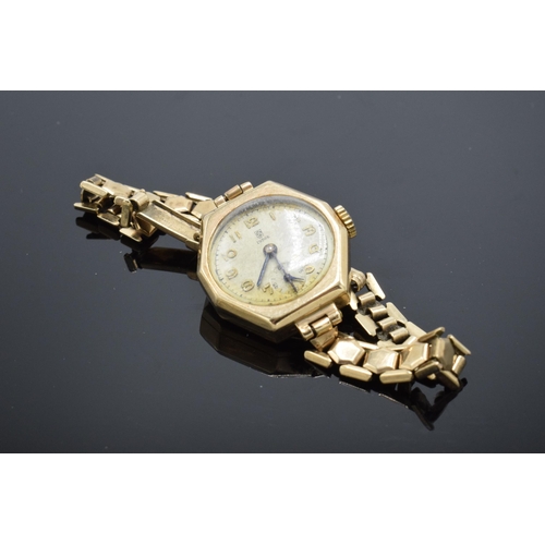 383 - 9ct gold cased Tudor ladies 17 rubies wristwatch on 9ct gold strap. 18.0 grams gross weight, 12.4 gr... 