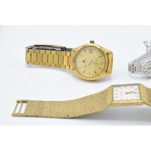 385 - A trio of vintage watches to include a ladies Rotary, a Roamer and a Tissot Seastar (3). All unteste... 