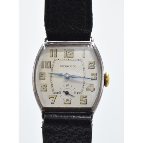 392 - A vintage Tiffany and Co sterling silver wristwatch on black leather Condor strap, in ticking order ... 