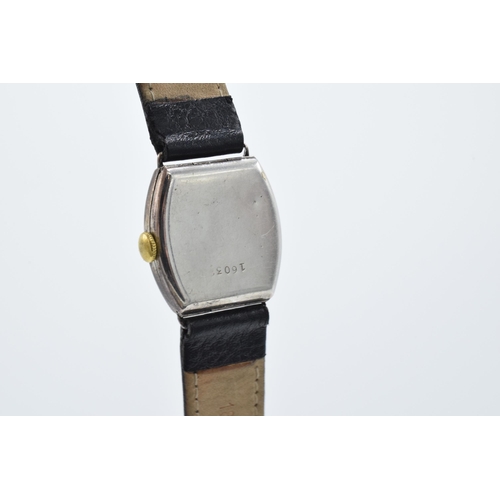 392 - A vintage Tiffany and Co sterling silver wristwatch on black leather Condor strap, in ticking order ... 