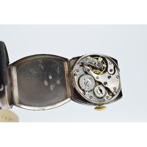 392 - A vintage Tiffany and Co sterling silver wristwatch on black leather Condor strap, in ticking order ... 