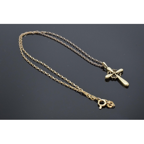 397 - 9ct gold link chain with 9ct gold crucifix pendant. 4.3 grams. Approx 46cm tall.