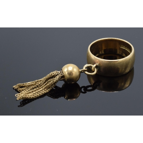 398 - 9ct gold ring with ball and tassel. 7.7 grams. UK size L/M.