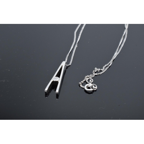 409 - 9ct white gold 'A' pendant on white gold chain set with diamond. 1.9 grams. 41cm length of chain.