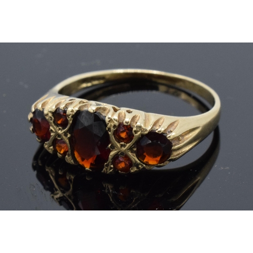 410 - 9ct gold garnet ring with approximately 1ct of garnet. 2.8 grams. Size Q.