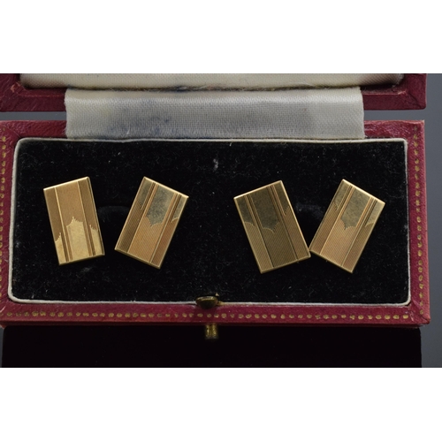 415 - A cased pair of 9ct gold cufflinks with full hallmarks to reverse. 5.4 grams.