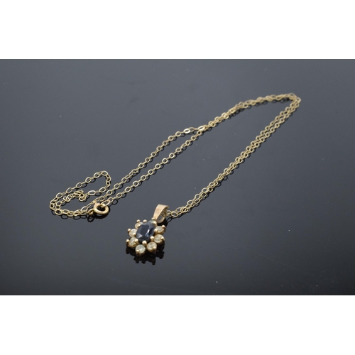 429 - 9ct gold chain and 9ct gold pendant set with sapphire and CZs. 1.2 grams. Chain approx 40cm long.