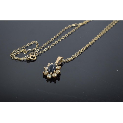 429 - 9ct gold chain and 9ct gold pendant set with sapphire and CZs. 1.2 grams. Chain approx 40cm long.