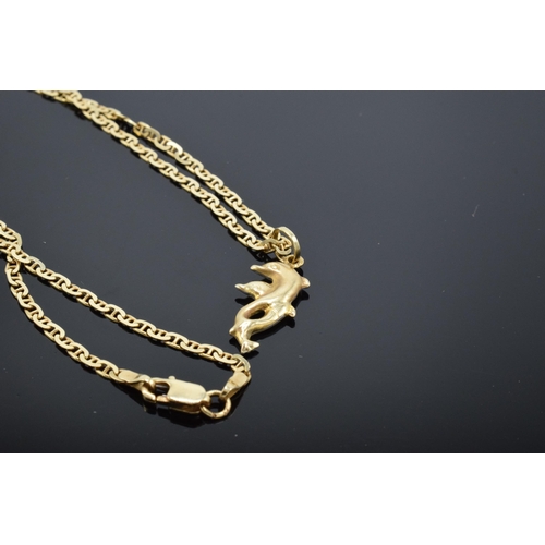 433 - 14ct gold necklace with 14ct gold and white gold dolphins pendant. 5.7 grams. 46cm long.