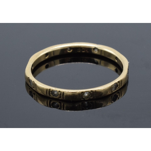 435 - 9ct gold stone set eternity ring. 1.2 grams. Size M/N.