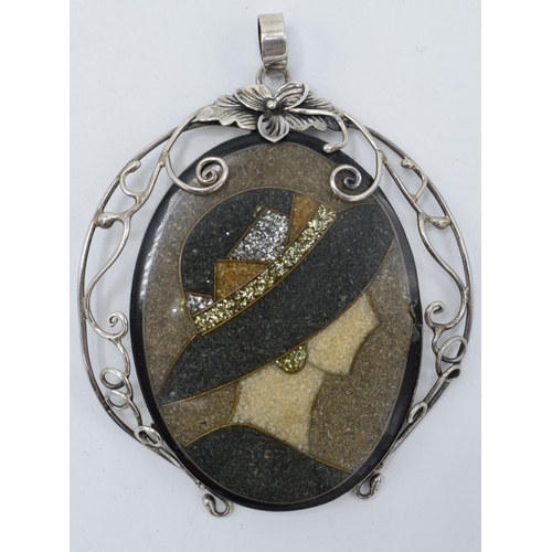 444 - A silver mounted mosaic-style portrait pendant, 8.5cm tall.